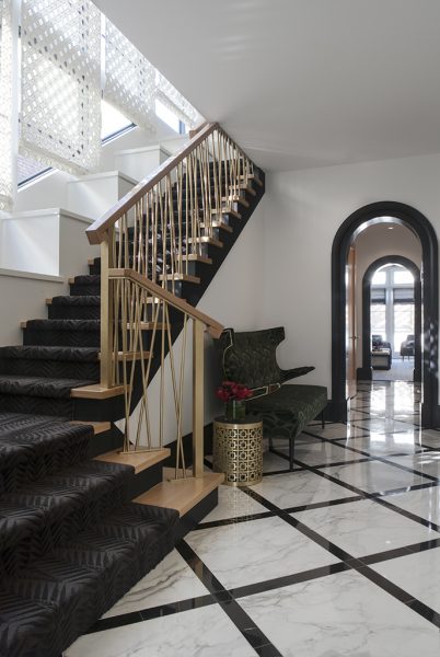 grand entryway, grand foyer, luxurious foyer, marble tile, gold staircase, black runner 
