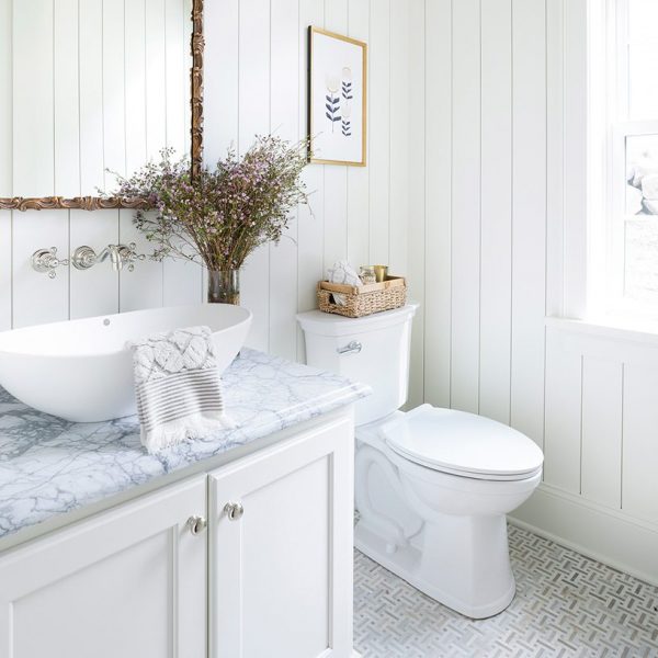 vessel sink, white vessel sink, round vessel sink, wall mount faucet, marble countertop, bathroom vanity