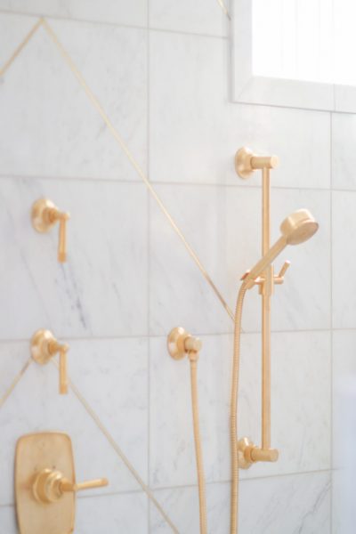 bathroom remodel, brass showerhead, gold showerhead