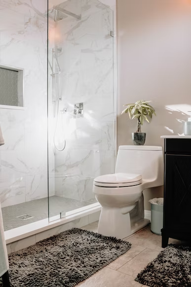white toilet with sustainable tile for bathroom design 